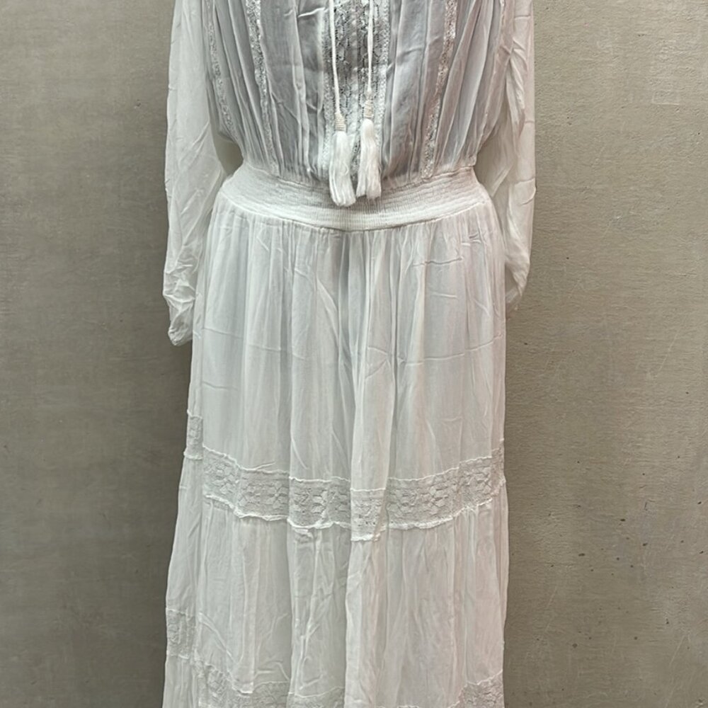 Dress by Miss June, Paris.Bahamian style.white